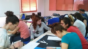 Alicia, Elisa, Irene y Leticia preparando la Semana de la Ciencia